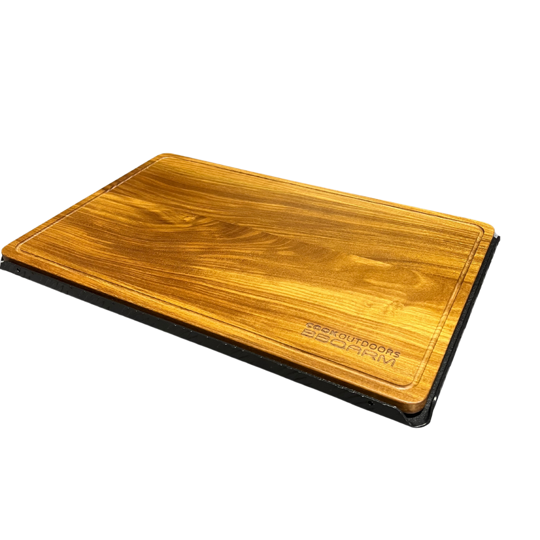 BBQARM teak cutting board sitting in BBQARM tray for caravan and camping outdoor food preparation