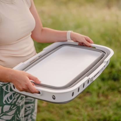 Xplore Outdoors collapsible camping laundry basket folded flat for compact storage and caravan travel